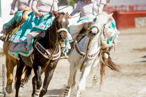 mexican girls riding backhorse