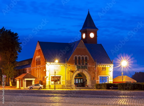 Central Market building at night, Vyborg, Russia photo