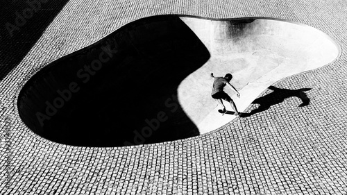 Young man skateboarding photo