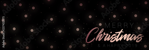 An abstract banner design for Christmas with rose gold lights on a black background