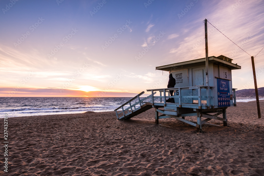 Lifeguard tower on one of the sandy Malibu beaches; beautiful sunset light; Pacific Ocean coastline, California Lifeguard tower on one of the sandy Malibu beaches; beautiful sunset light; Pacific Ocean coastline, California