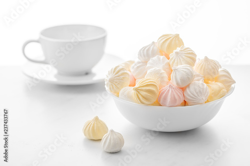 sweet marshmallows in a cup, delicious dessert, on a white background