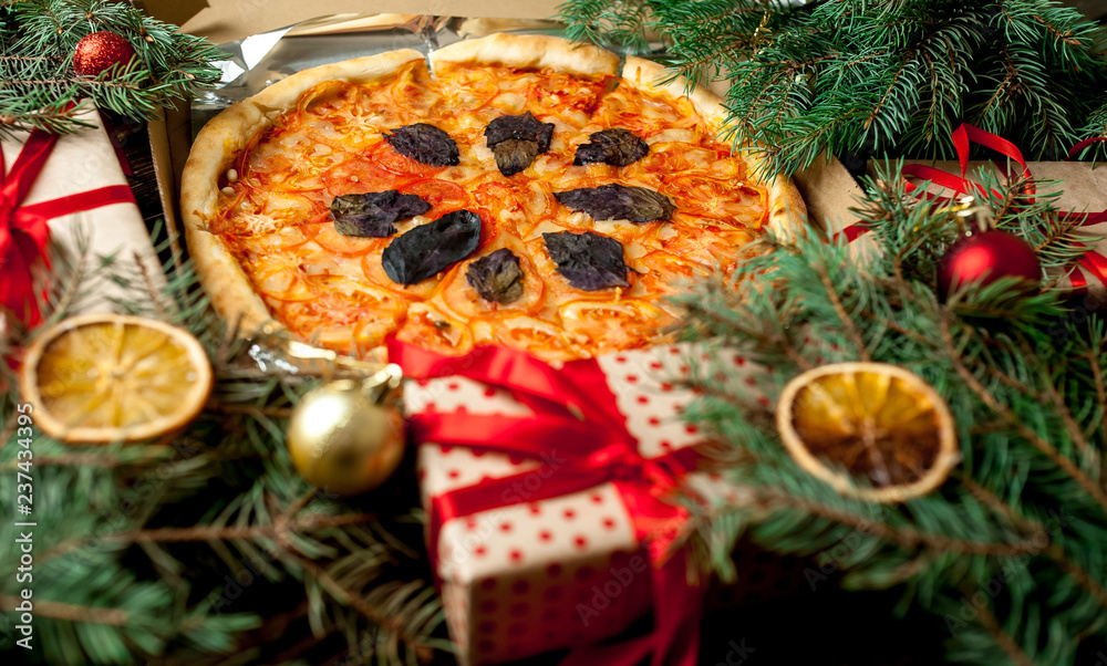 pizza with Christmas decorations, gift, spruce, toys pizza with Christmas decorations, gift, spruce, toys