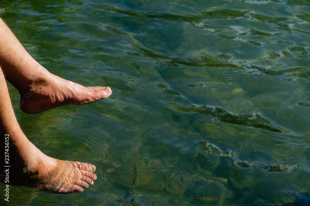 feet in the water