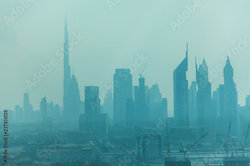 Dubai  UAE - October  2018. Beautiful skyline of Dubai surrounded by sand dust at day light