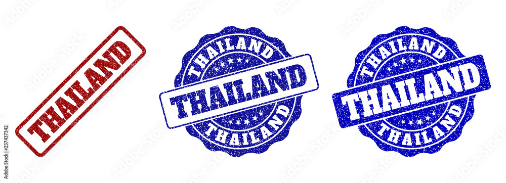 Obraz premium THAILAND scratched stamp seals in red and blue colors. Vector THAILAND labels with grainy effect. Graphic elements are rounded rectangles, rosettes, circles and text labels.