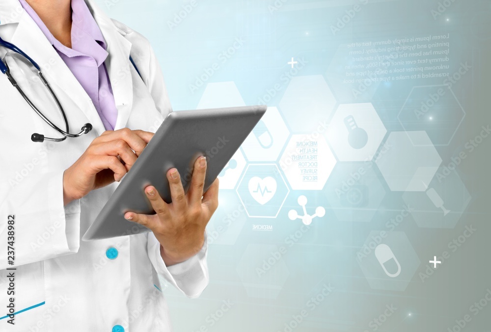 Close-up Doctor at hospital working with tablet pc Close-up Doctor at hospital working with tablet pc