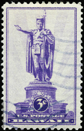 Statue of King Kamehameha on old postage stamp of Hawaii photo