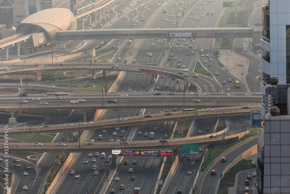 Dubai, UAE - October, 2018. Dubai roads, junction, intersection. Dubai car traffic, busy roads. Dubai Downtown. United Arab Emirates. Dubai highways.
