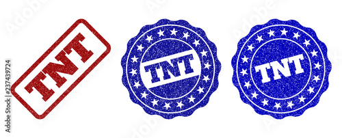 Foto TNT scratched stamp seals in red and blue colors