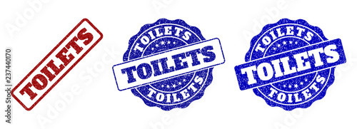 TOILETS grunge stamp seals in red and blue colors. Vector TOILETS overlays with grunge surface. Graphic elements are rounded rectangles, rosettes, circles and text tags.