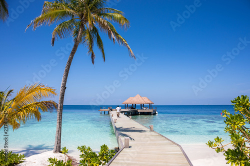 White sand beach and crystal clear water in the Maldives