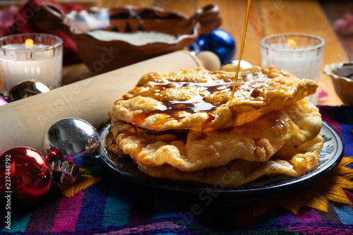 Mexican buñuelos with piloncillo syrup photo