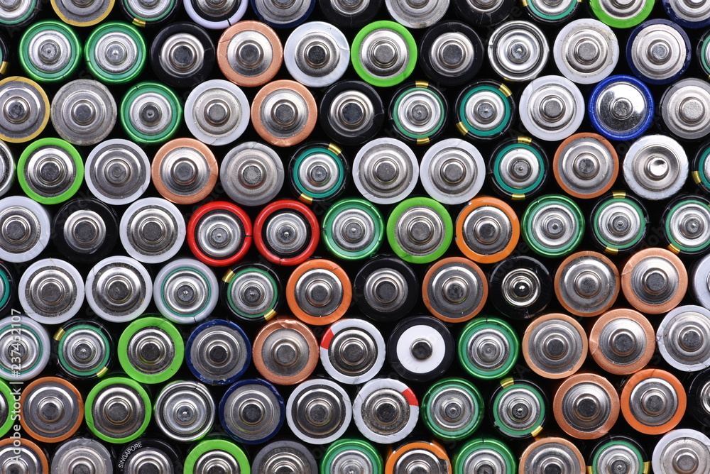Top view of alkaline battery AA size energy background Top view of alkaline battery AA size energy background