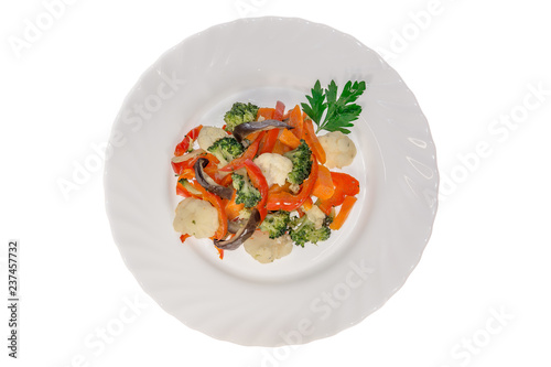 fried vegetables. isolate. decorated with greens. restaurant food