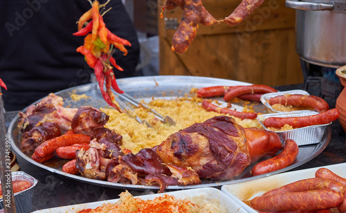 Buncek- traditional croatian ham hock, served with stewed cabbage at the Advent Market in Zagreb.