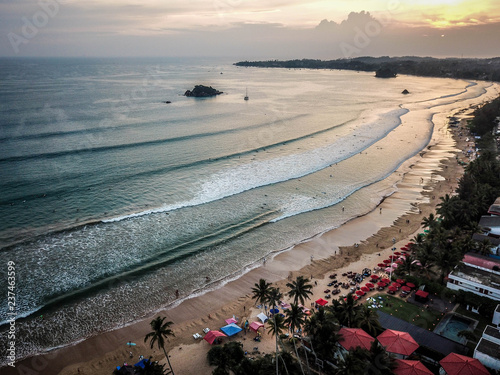 Sunset on the beach. Surfing. Waves. Weligama, Sri lanka