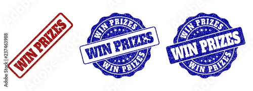 WIN PRIZES grunge stamp seals in red and blue colors. Vector WIN PRIZES labels with grainy surface. Graphic elements are rounded rectangles, rosettes, circles and text labels.
