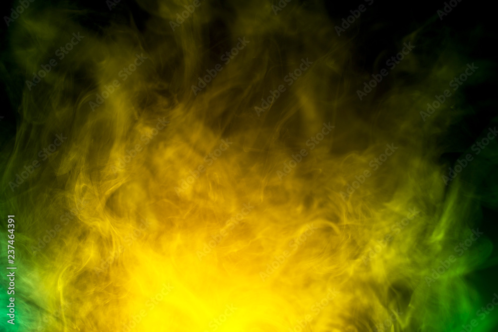 abstract yellow and green smoke on black background abstract yellow and green smoke on black background