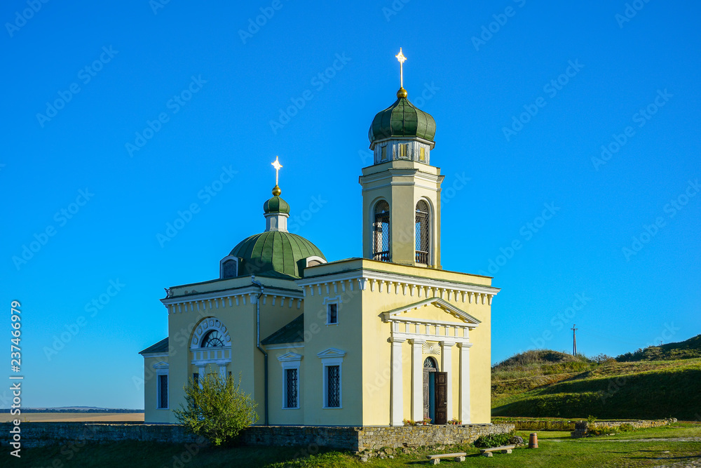 Religious building, Orthodox Christian cathedral with green domes. Church of St. Alexander Nevsky near ..Khotyn Fortress.