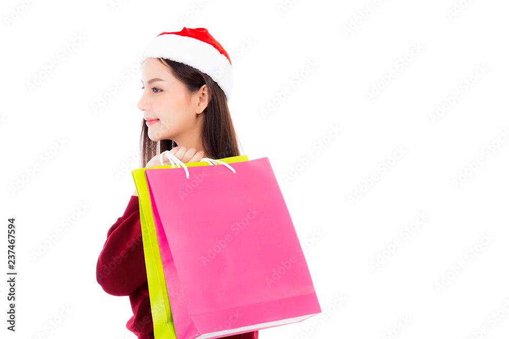 Happy fashion asian woman with smile holding shopping paper bag, Sale and christmas with holiday, girl with buyer enjoy and excited isolated on white background, season holiday concept. Happy fashion asian woman with smile holding shopping paper bag, Sale and christmas with holiday, girl with buyer enjoy and excited isolated on white background, season holiday concept.