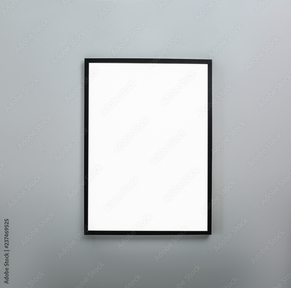 Frame with empty canvas on wall in modern art gallery. Mockup for design Frame with empty canvas on wall in modern art gallery. Mockup for design