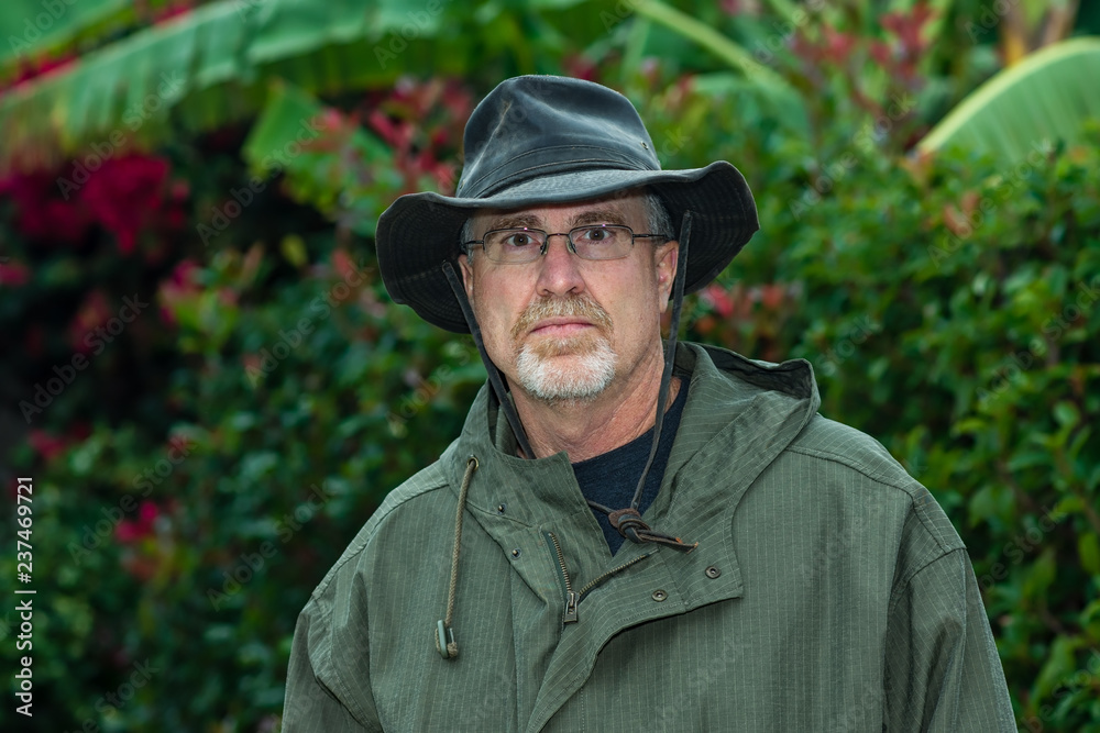 Portrait of a man in hat with serious expression Portrait of a man in hat with serious expression