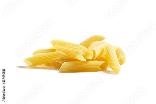 Uncooked penne rigate italian pasta, isolated on white background