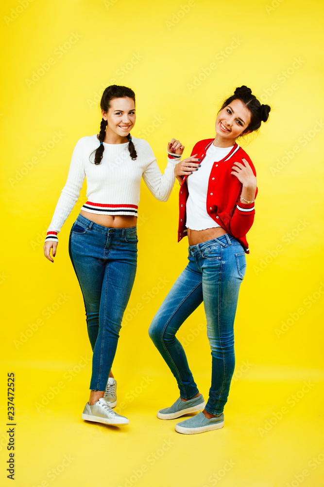 lifestyle people concept: two pretty young school teenage girls 