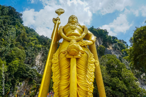 Golden statue of Lord Murugan at the entrance to the Batu cave. Kuala Lumpur  Malaysia