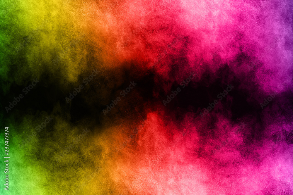 abstract colored dust explosion on a black background.abstract powder splatted background,Freeze motion of color powder exploding/throwing color powder, multicolored glitter texture.