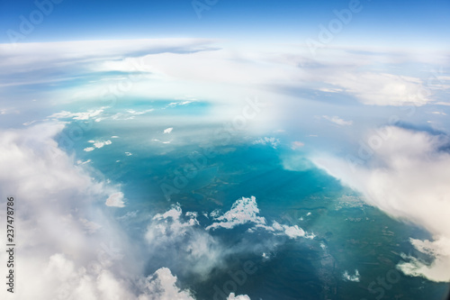 Aerial view of clouds and earth from above