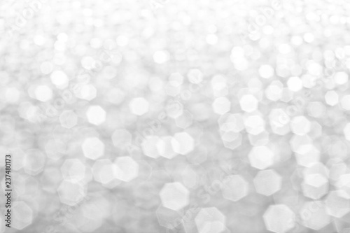 Abstract silver lights glister bokeh background concept copy space shiny blurred lights ,Christmas Background
