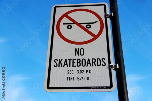 no skateboarding or you will pay a fine sign