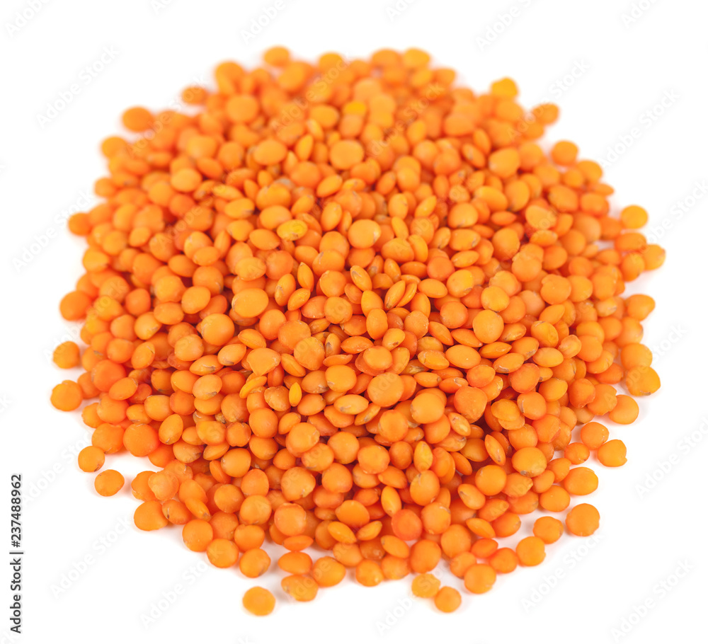 pile red lentils isolated on white background