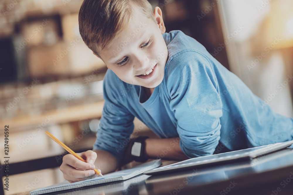 Close up of cheerful boy that drawing picture Close up of cheerful boy that drawing picture