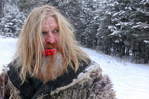 Portrait of a grandfather in a sheepskin photo