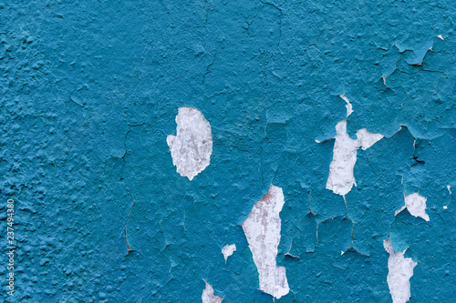 Obraz na płótnie light coloured blue peeling paint on the old rough concrete surface w salonie