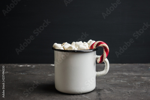 Sweet hot chocolate in mug. Christmas drink with marshmallow. Selective focus. Shallow depth of field. 