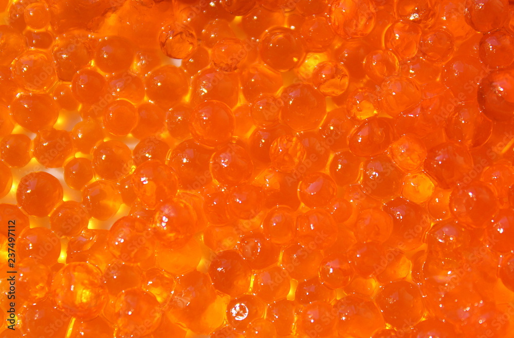 Texture red fish roe spread out in a thin layer Texture red fish roe spread out in a thin layer