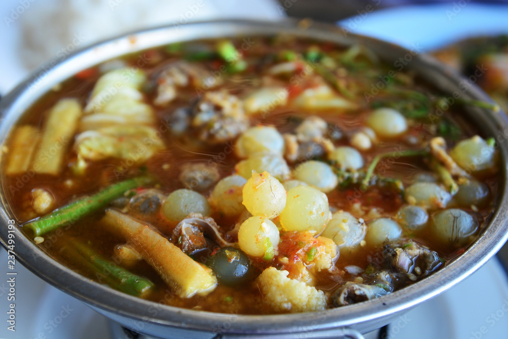Giant sea catfish eggs with spicy sour soup and vegetable Giant sea catfish eggs with spicy sour soup and vegetable
