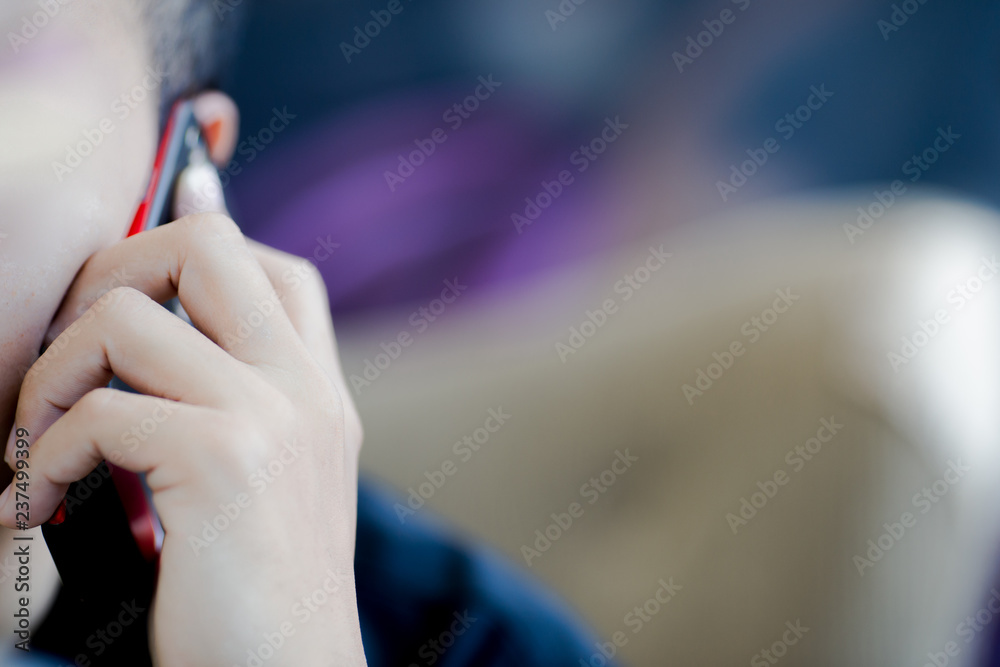 Blurred background of people who are contacting the phone. To expand business opportunities.