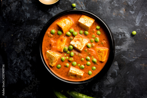Green peas or matar paneer curry recipe, served in a bowl. selective focus photo