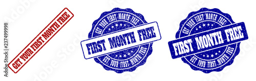 GET YOUR FIRST MONTH FREE grunge stamp seals in red and blue colors. Vector GET YOUR FIRST MONTH FREE labels with dirty style. Graphic elements are rounded rectangles, rosettes,