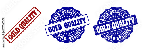 GOLD QUALITY grunge stamp seals in red and blue colors. Vector GOLD QUALITY marks with grunge style. Graphic elements are rounded rectangles, rosettes, circles and text captions.