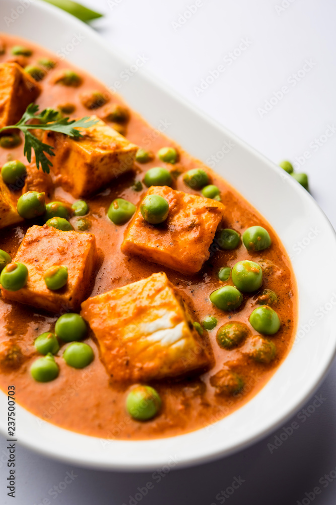 Green peas or matar paneer curry recipe, served in a bowl. selective focus Green peas or matar paneer curry recipe, served in a bowl. selective focus