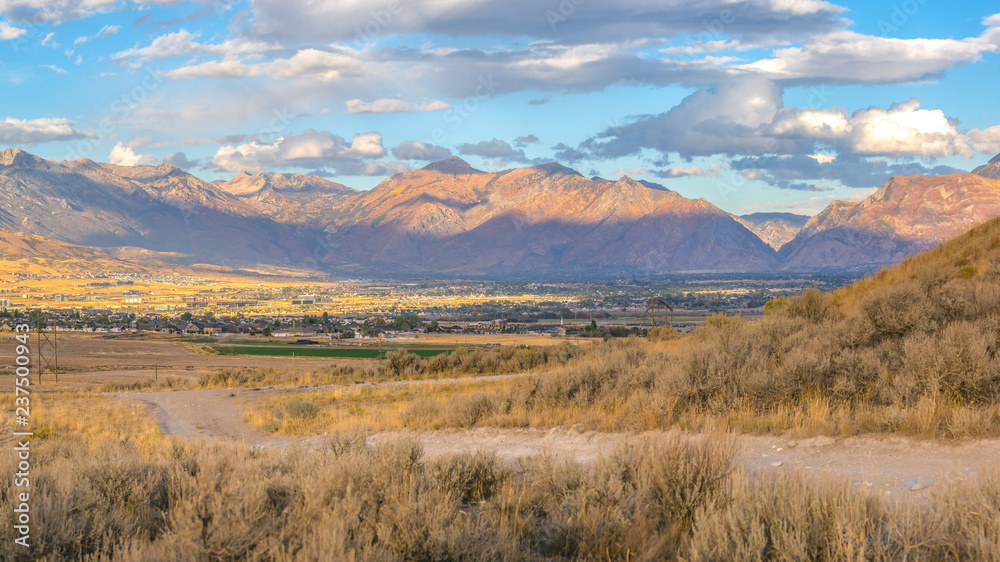 Dirt road leading to homes in sunny Utah Valley Dirt road leading to homes in sunny Utah Valley