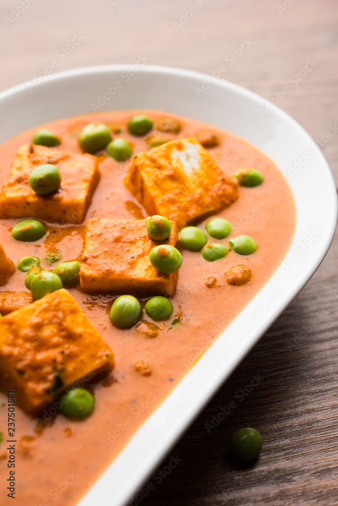 Green peas or matar paneer curry recipe, served in a bowl. selective focus Green peas or matar paneer curry recipe, served in a bowl. selective focus