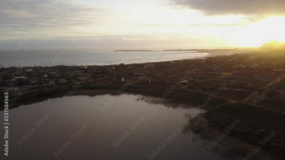 Aerail view of sunset over lake and beach front Aerail view of sunset over lake and beach front