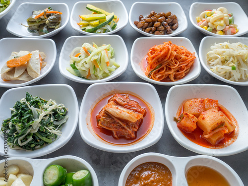 Set of slide food in white small plate serve in korean style barbecue restaurant.